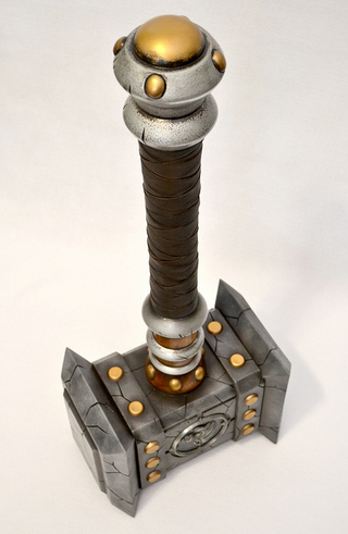 Illustration for article titled Man Builds Giant World of Warcraft Hammer
